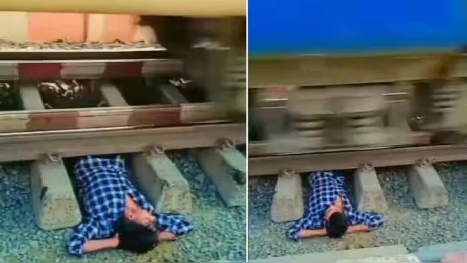 today viral video man lying under railway tracks while train runs on it ...