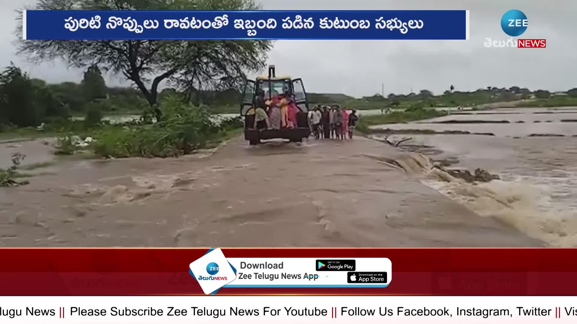 regnant Woman Crossed Road With Help Of Jcb In Nizamabad District