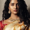 Actress Anupama Photos: మలయాళ బ్యూటీ అనుపమ పరమేశ్వరన్ చీరకట్టులో అందాల విందు!