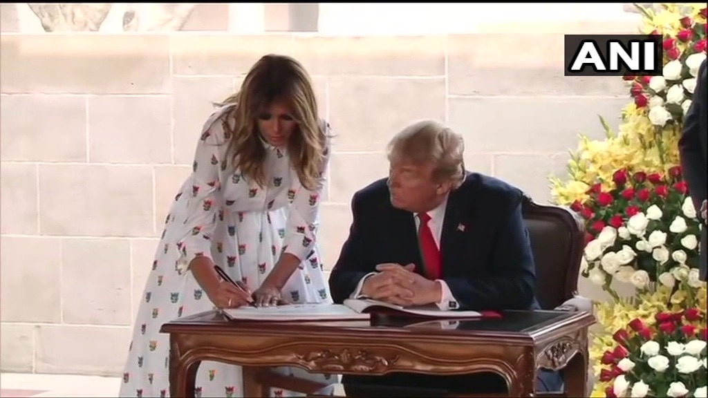 Melania Trump signs visitors book at Raj ghat