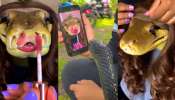 Snake Video: ఇదెక్కడి విడ్డూరం.. విషపూరితమైన పాముకు లిప్ స్టిక్ పెట్టి, హెయిర్ స్టైల్.. వీడియో వైరల్..