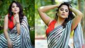 Anasuya Bharadwaj Hot Pics: అందానికి కేరాఫ్ అడ్రస్ అనసూయ భరద్వాజ్.. చేతులు పైకెత్తి నడుము వంపులు చూపించేస్తుందిగా!