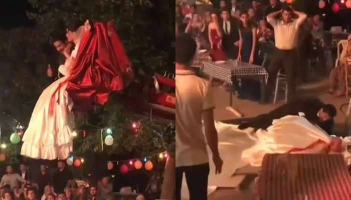 Newlyweds fall from JCB, Viral Video : కొత్తగా ట్రై చేసిన నవజంట.. జేసీబీ నుంచి కింద పడి షాక్ ఇచ్చారు!