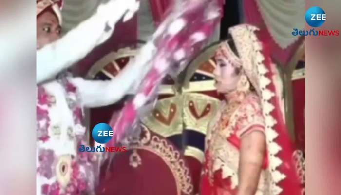 Viral Video of bride and groom throws garlands