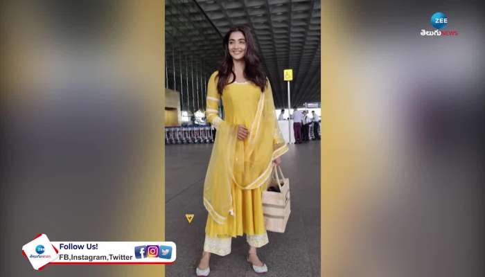 Pooja Hegde In A Beautiful Yellow Suit At The Mumbai Airport