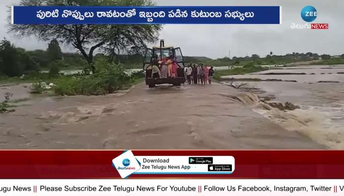 regnant Woman Crossed Road With Help Of Jcb In Nizamabad District