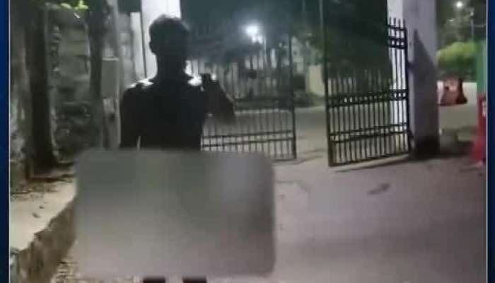 Rajanna sircilla Drunk man naked in front of police station goes viral pa