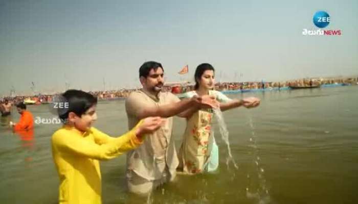 ap minister nara lokesh and brahmani visits kumbh mela takes holy dip pa