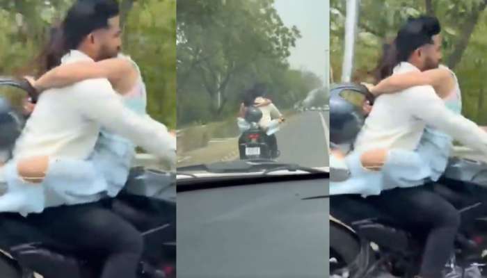 Lovers Romance on bike video: రన్నింగ్ బైక్ మీద లవర్స్ గలీజ్ పని.. లిప్ లాక్ చేస్తూ,  హగ్ లతో టెంప్ట్ చేస్తున్న యువతి.. వీడియో వైరల్..
