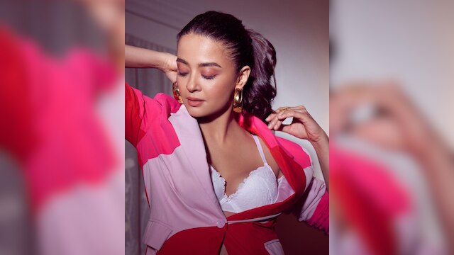 Surveen Chawla Looks Stunning In A White Bralette And Multi Coloured Blazer  Outfit